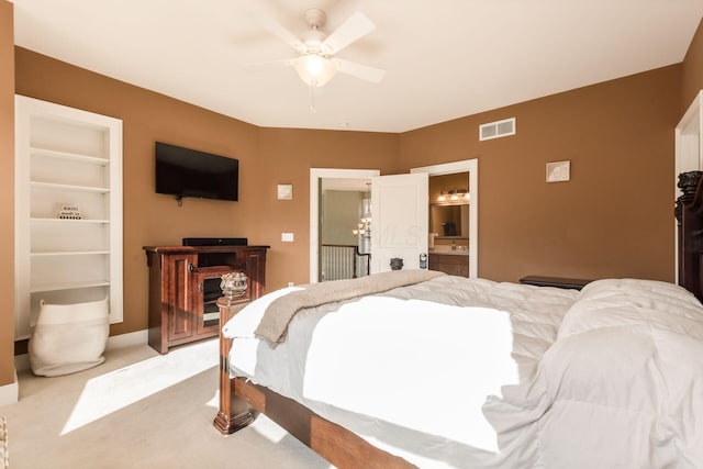 16187 Kreashbaum Rd, Rockbridge, OH 43149 - bedroom with connected bathroom, ceiling fan, light carpet, baseboards, and visible vents