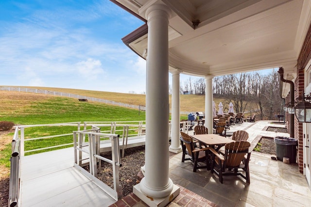 16187 Kreashbaum Rd, Rockbridge, OH 43149 - view of patio with a rural view and outdoor dining space