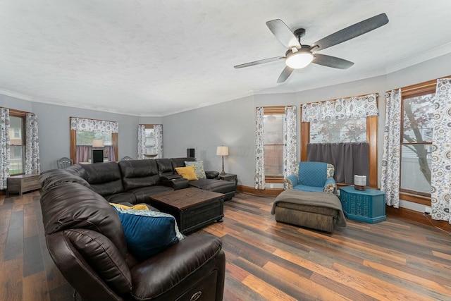 living area with crown molding, ceiling fan, and wood finished floors