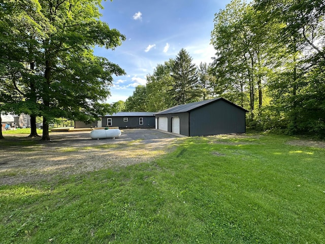 5614 US Highway 42, Mount Gilead, OH 43338 - view of grassy yard with a garage and an outdoor structure