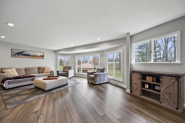 11378 Ann Dr NW, Baltimore, OH 43105 - living room featuring baseboards, recessed lighting, and wood finished floors