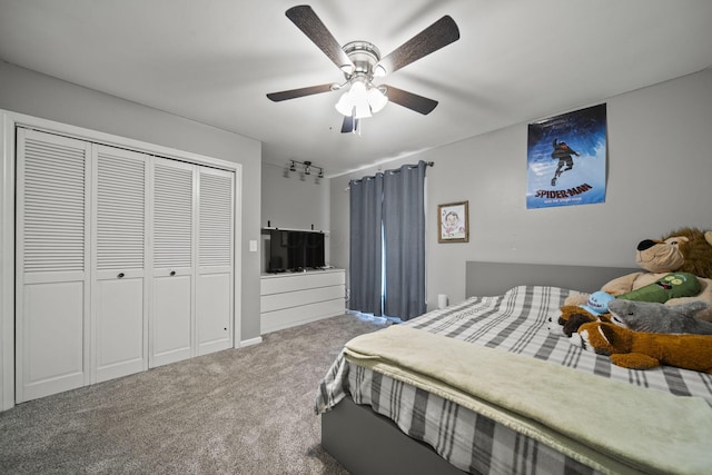 11378 Ann Dr NW, Baltimore, OH 43105 - bedroom featuring a closet, carpet flooring, and a ceiling fan