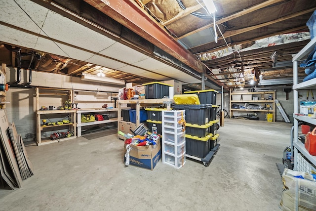 11378 Ann Dr NW, Baltimore, OH 43105 - unfinished below grade area with a workshop area
