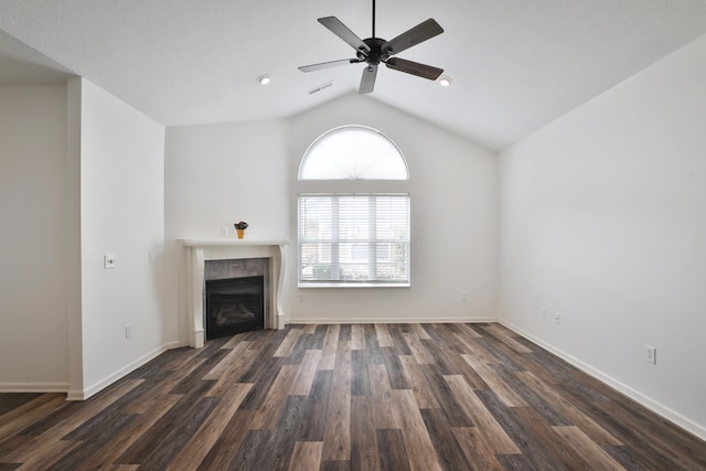 8050 Flint Run Pl, Columbus, OH 43235 - unfurnished living room with a tile fireplace, lofted ceiling, dark wood finished floors, a ceiling fan, and baseboards