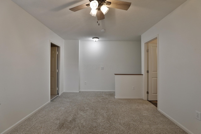 8050 Flint Run Pl, Columbus, OH 43235 - unfurnished room featuring a ceiling fan, carpet floors, baseboards, and a smoke detector