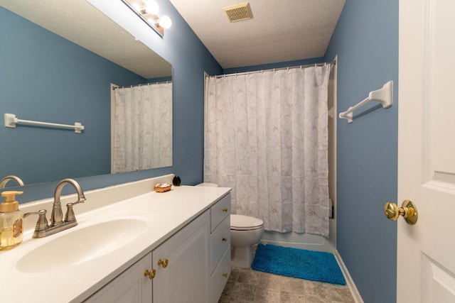 full bathroom featuring visible vents, toilet, vanity, baseboards, and a textured ceiling