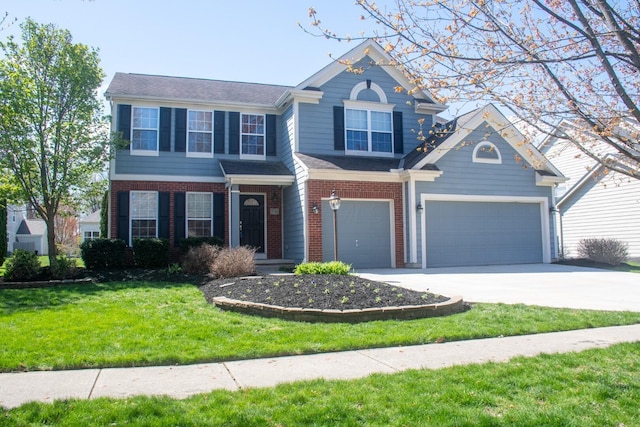 traditional-style house featuring an attached garage, driveway, a front lawn, and brick siding