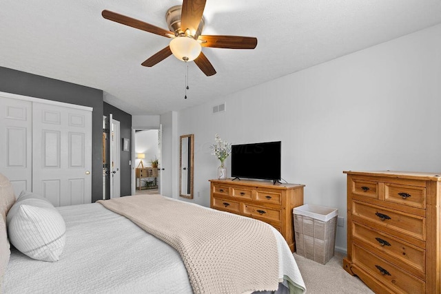 3379 Fishinger Mill Dr, Hilliard, OH 43026 - bedroom with light colored carpet, ceiling fan, and a closet
