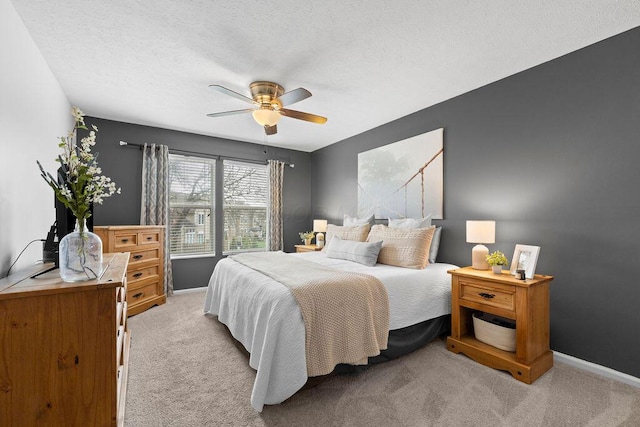 3379 Fishinger Mill Dr, Hilliard, OH 43026 - bedroom featuring carpet, baseboards, ceiling fan, and a textured ceiling