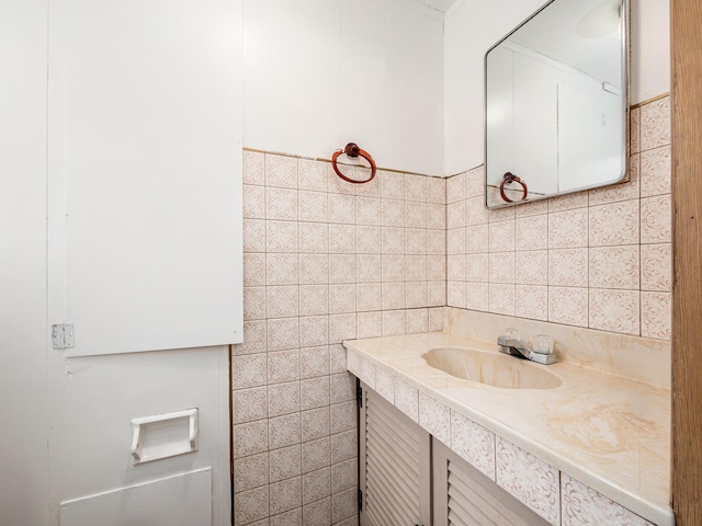 bathroom with tile walls and vanity