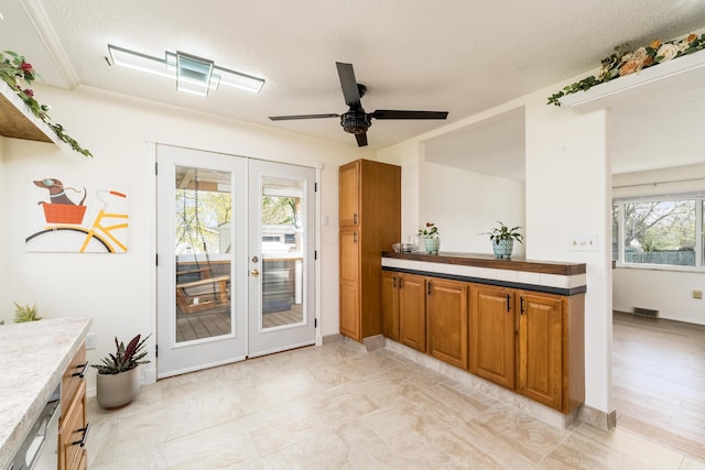 1706 Kinross Ln, Galloway, OH 43119 - entryway featuring plenty of natural light, visible vents, ceiling fan, and french doors