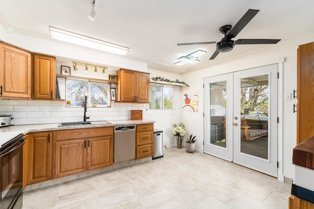 1706 Kinross Ln, Galloway, OH 43119 - kitchen featuring tasteful backsplash, a sink, dishwasher, ceiling fan, and french doors