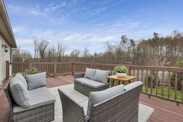 wooden deck featuring outdoor lounge area