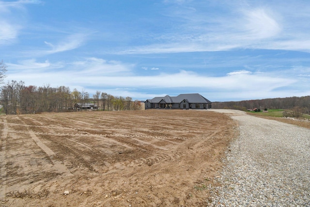 exterior space featuring gravel driveway