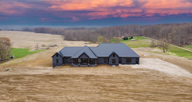 view of front of house featuring metal roof