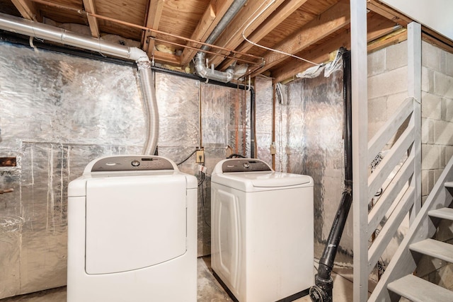 laundry area with laundry area and independent washer and dryer