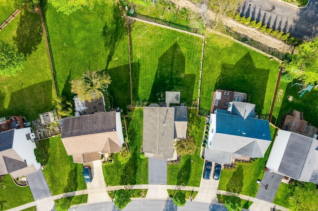 birds eye view of property with a residential view