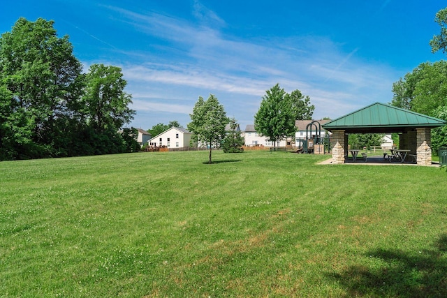 view of yard featuring a playground and a gazebo