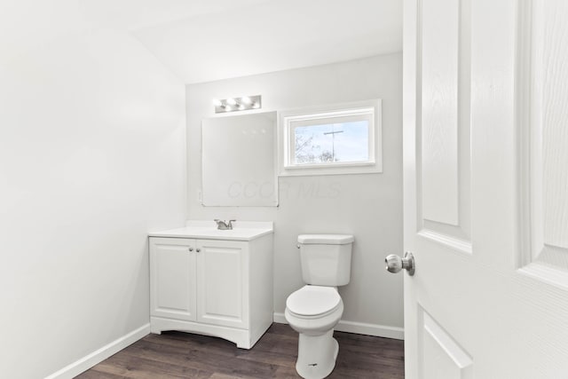 378 Maple Ave, Newark, OH 43055 - half bath featuring baseboards, toilet, and wood finished floors