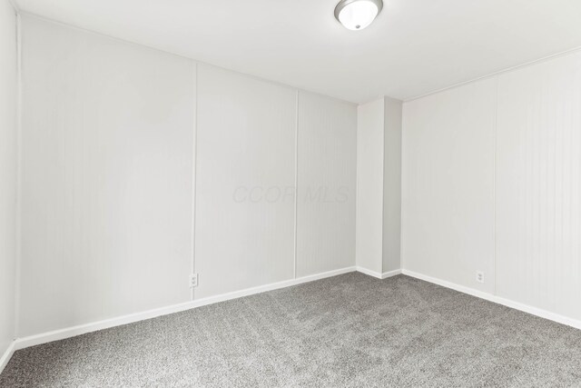 378 Maple Ave, Newark, OH 43055 - carpeted empty room with baseboards