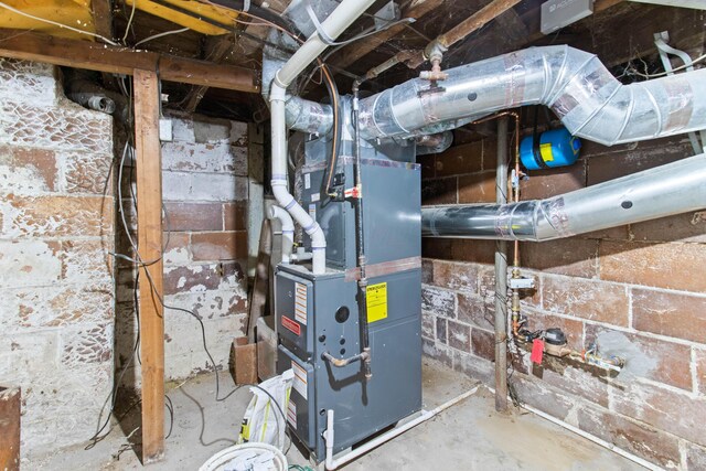 378 Maple Ave, Newark, OH 43055 - utility room featuring heating unit