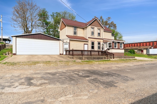 9 S 11th St, Newark, OH 43055 - view of front of home with an outdoor structure and a garage