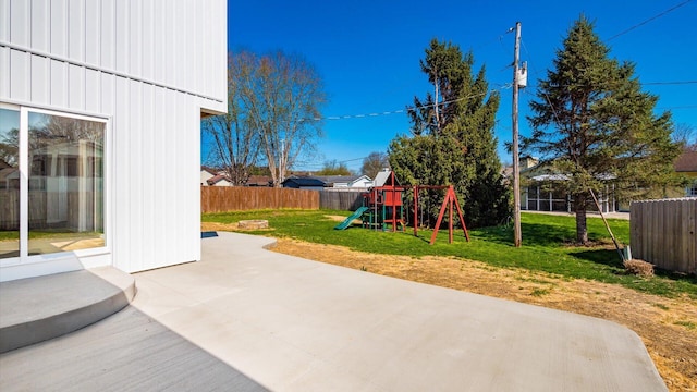 500 Hemlock Pl, Newark, OH 43055 - view of patio / terrace with a fenced backyard and a playground