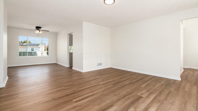 500 Hemlock Pl, Newark, OH 43055 - spare room with ceiling fan, baseboards, wood finished floors, and visible vents