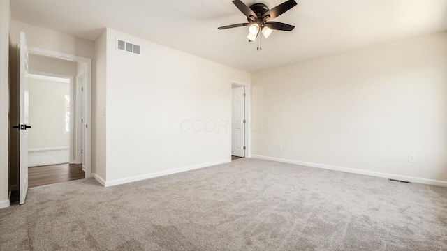 500 Hemlock Pl, Newark, OH 43055 - carpeted spare room featuring baseboards, a ceiling fan, and visible vents