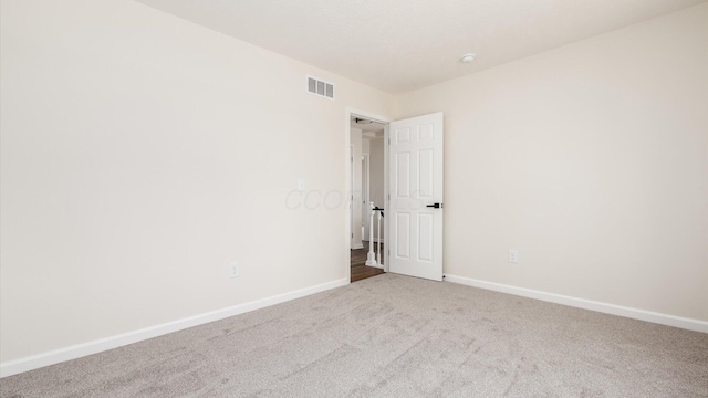 500 Hemlock Pl, Newark, OH 43055 - spare room with baseboards, carpet floors, and visible vents