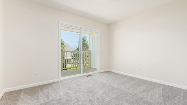 500 Hemlock Pl, Newark, OH 43055 - empty room with visible vents, baseboards, and carpet flooring