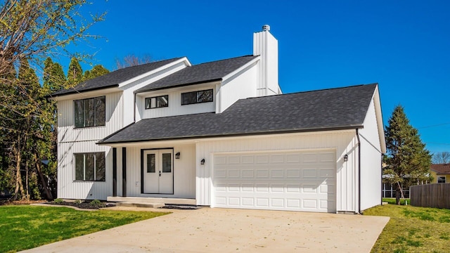 500 Hemlock Pl, Newark, OH 43055 - modern farmhouse with a chimney, driveway, a shingled roof, and a garage