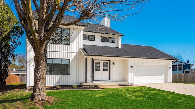 500 Hemlock Pl, Newark, OH 43055 - view of front of house featuring a front lawn, concrete driveway, fence, a garage, and a shingled roof