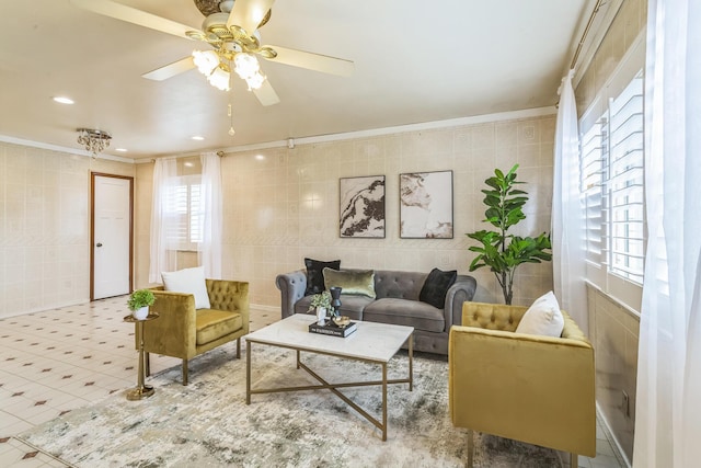 5072 Teddy Dr, Columbus, OH 43227 - living area featuring ornamental molding, ceiling fan, a wealth of natural light, and tile walls