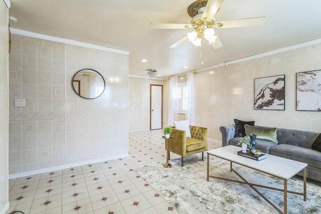 5072 Teddy Dr, Columbus, OH 43227 - living area featuring crown molding, tile patterned floors, tile walls, and a ceiling fan