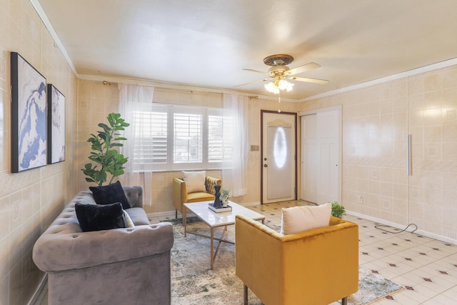 5072 Teddy Dr, Columbus, OH 43227 - living area with tile walls, crown molding, and a ceiling fan