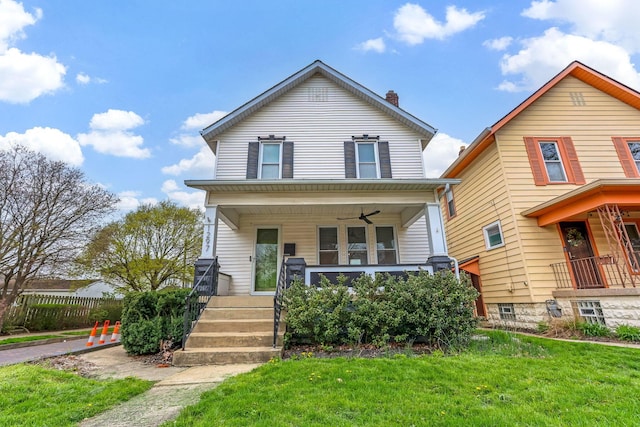 1297 S 4th St, Columbus, OH 43206 - view of front of house with a porch, ceiling fan, and a front yard
