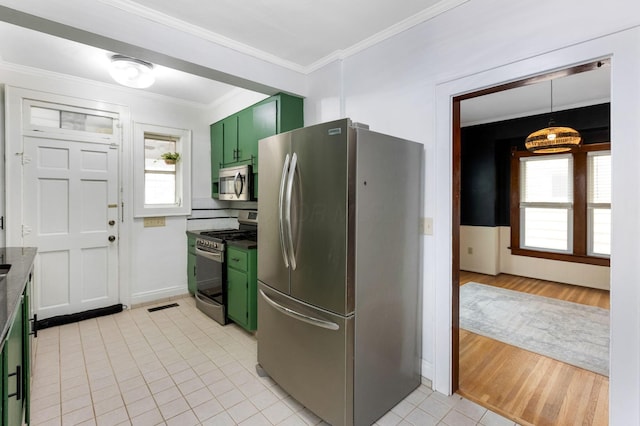 1297 S 4th St, Columbus, OH 43206 - kitchen featuring crown molding, light tile patterned floors, green cabinets, appliances with stainless steel finishes, and visible vents