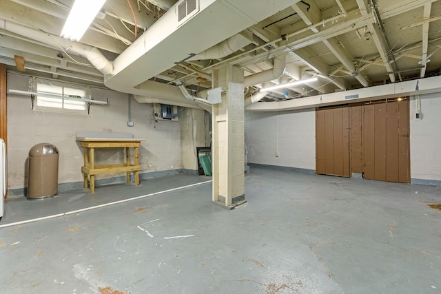1297 S 4th St, Columbus, OH 43206 - below grade area featuring concrete block wall and visible vents