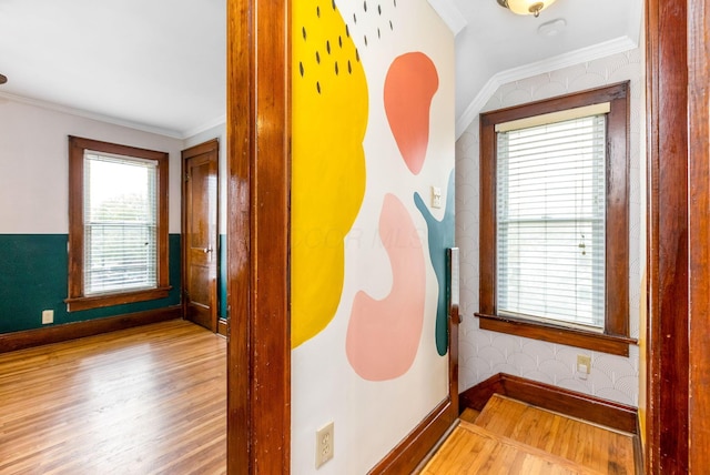 1297 S 4th St, Columbus, OH 43206 - corridor with baseboards, crown molding, wood finished floors, and wallpapered walls