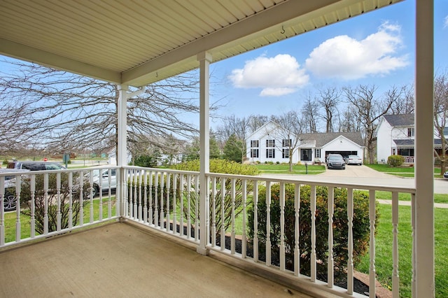 balcony with a porch and a residential view