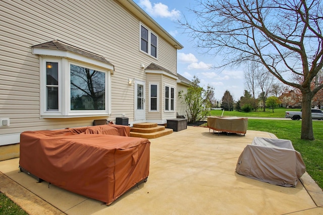 view of patio with an outdoor living space, entry steps, and central AC