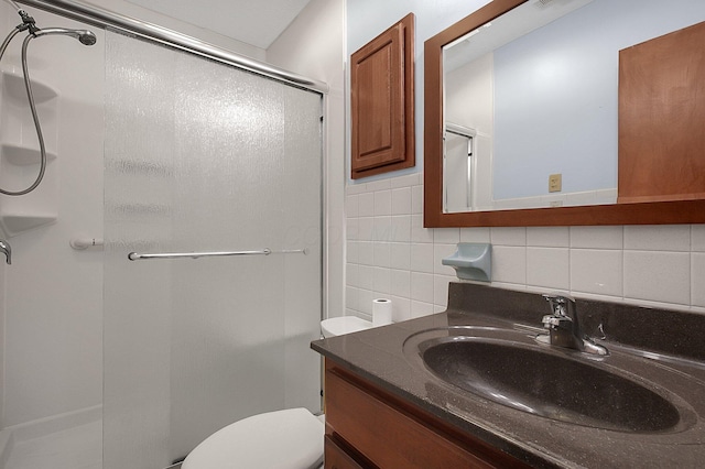 full bathroom with toilet, a shower stall, vanity, and decorative backsplash