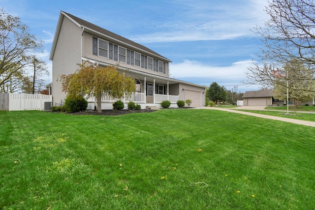 191 Craig Dr, Thornville, OH 43076 - view of front facade featuring covered porch, a front yard, fence, and a garage