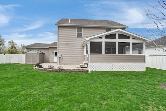 191 Craig Dr, Thornville, OH 43076 - back of property featuring a patio, a storage shed, a fenced backyard, an outbuilding, and a sunroom
