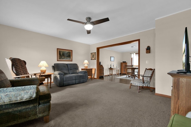 191 Craig Dr, Thornville, OH 43076 - carpeted living area featuring baseboards, ornamental molding, and ceiling fan