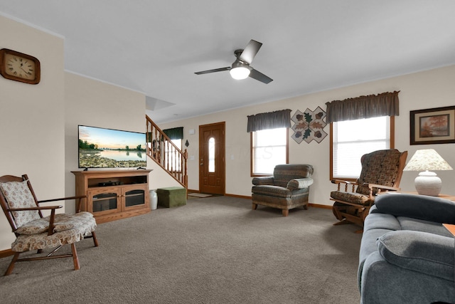191 Craig Dr, Thornville, OH 43076 - carpeted living room featuring ceiling fan, stairway, and baseboards