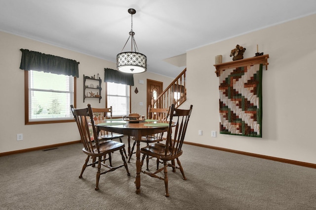 191 Craig Dr, Thornville, OH 43076 - dining area featuring stairway, baseboards, and carpet