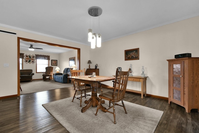 191 Craig Dr, Thornville, OH 43076 - dining room featuring baseboards, crown molding, and wood finished floors