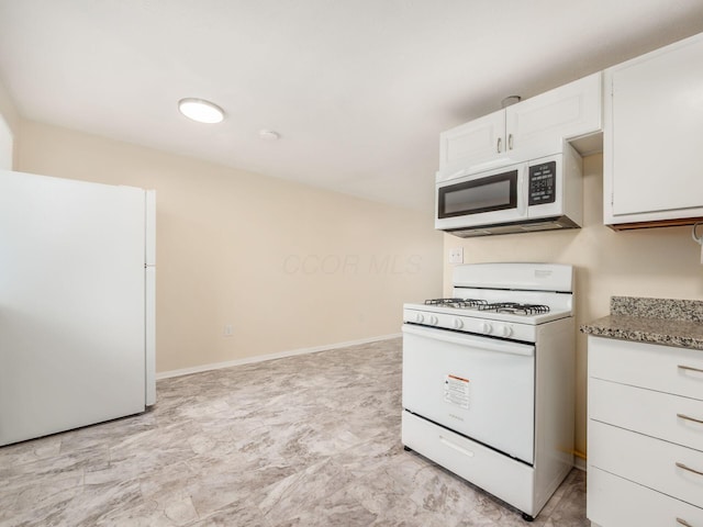 3198 Benham Ct, Columbus, OH 43232 - kitchen featuring white cabinets, light stone countertops, and white appliances